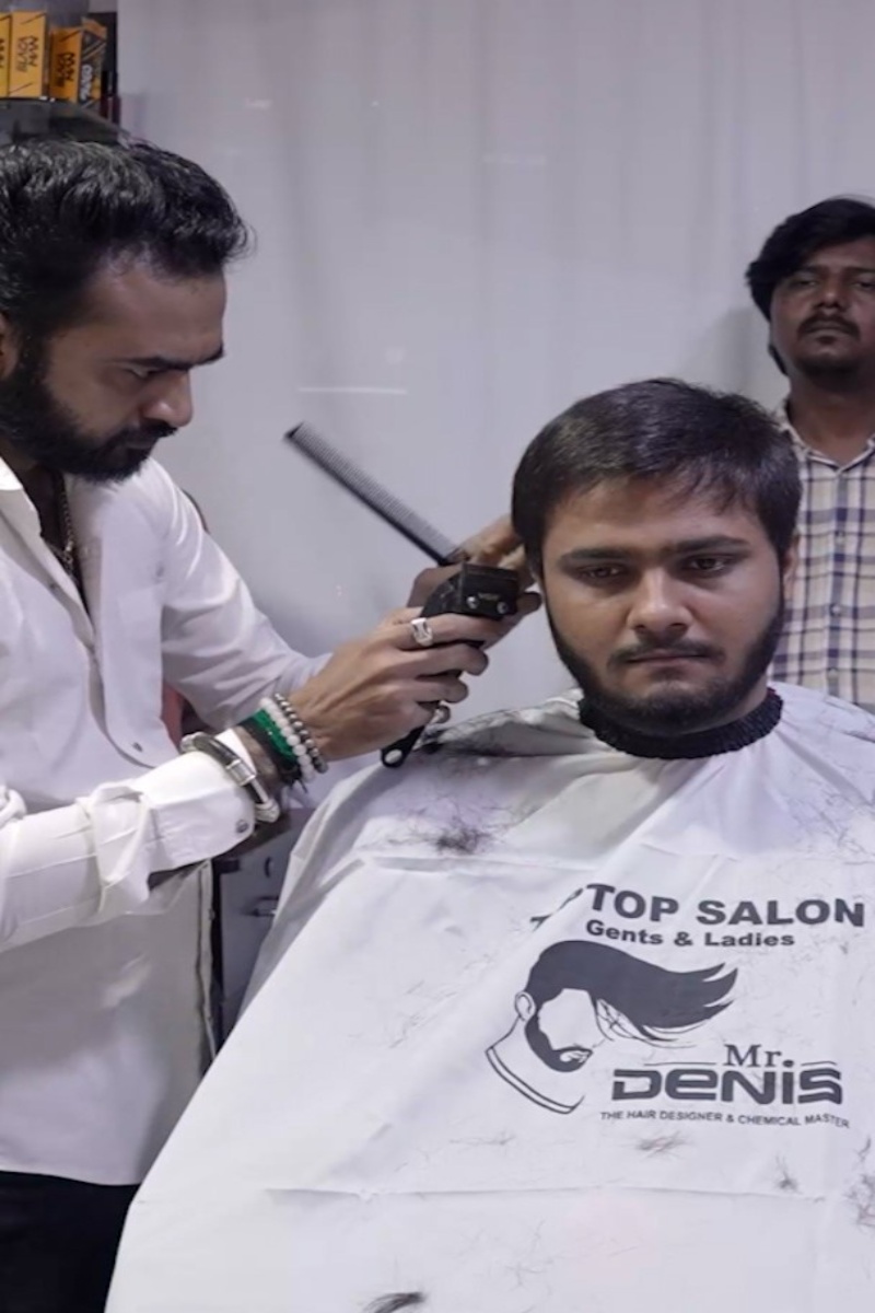 Video thumbnail for Fastest time to complete a tapered haircut - 44.83 seconds by Denishkumar Pravinbhai Bhatti