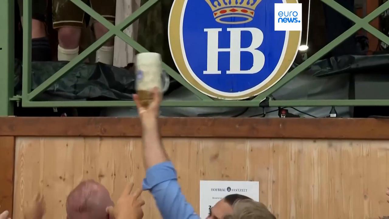 Video thumbnail for The keg is tapped: Munich springs to life as Oktoberfest returns