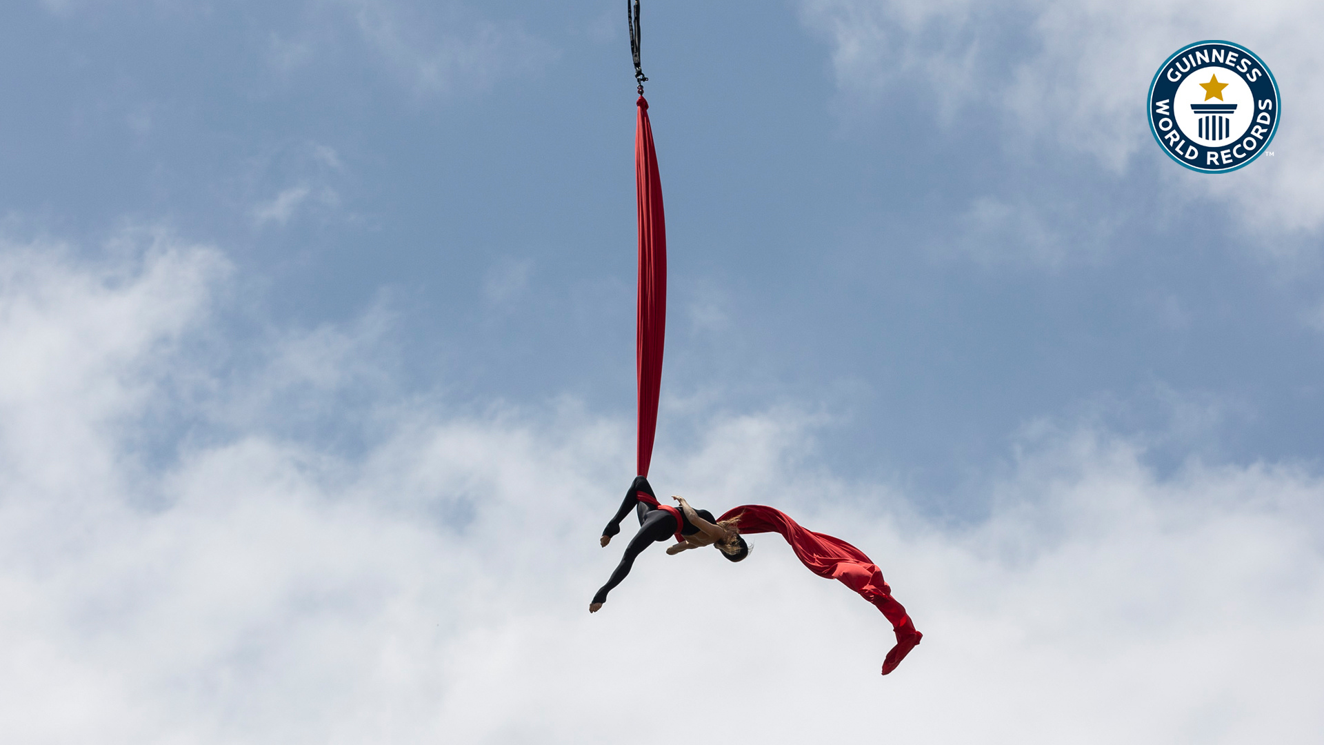 'Video thumbnail for Erika Lemay sets world record for blindfolded aerial silk roll'
