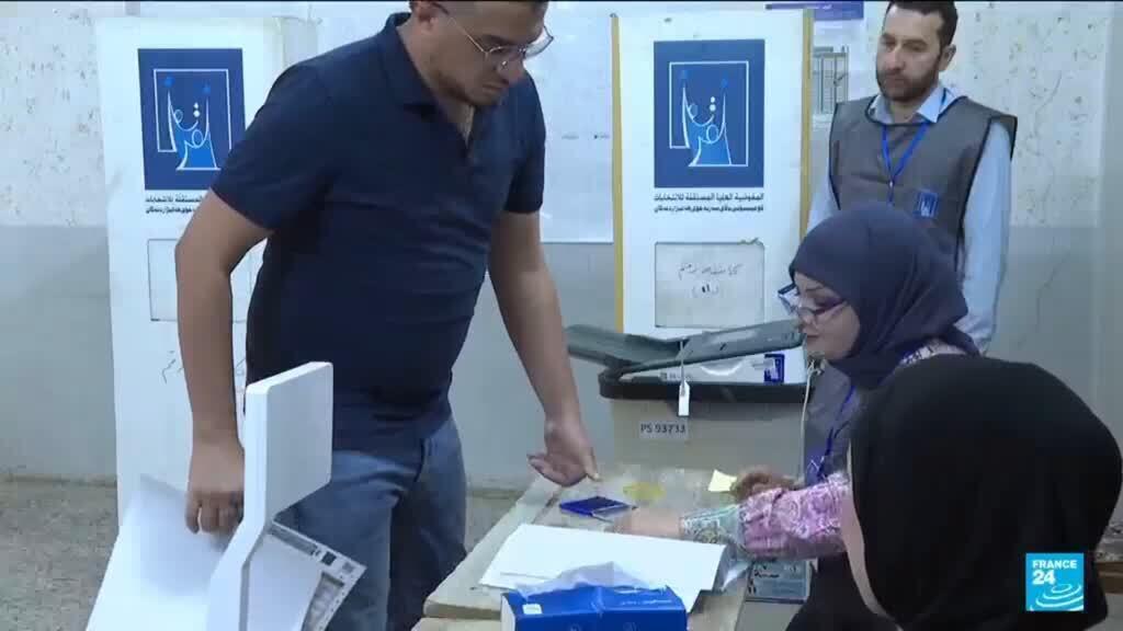 Video thumbnail for Iraqis vote in a parliamentary election marked by tight security and a political boycott