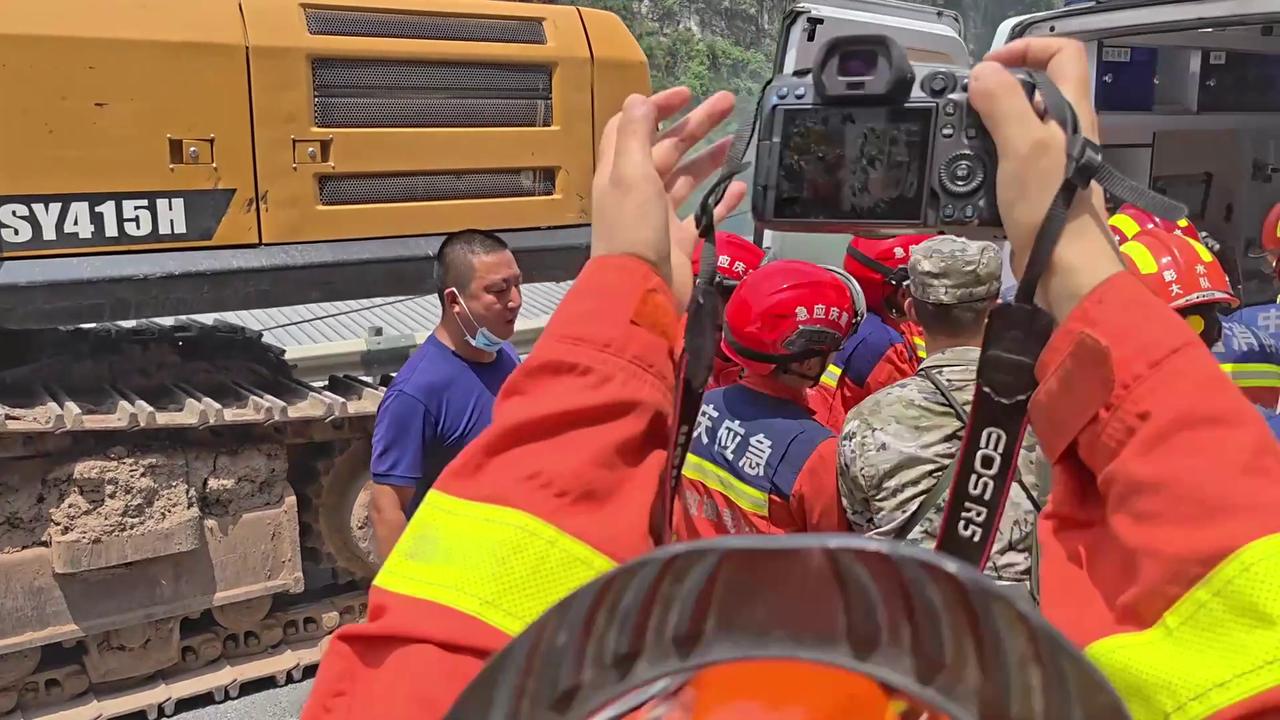 Video thumbnail for China: Seven rescued from Chongqing landslide.