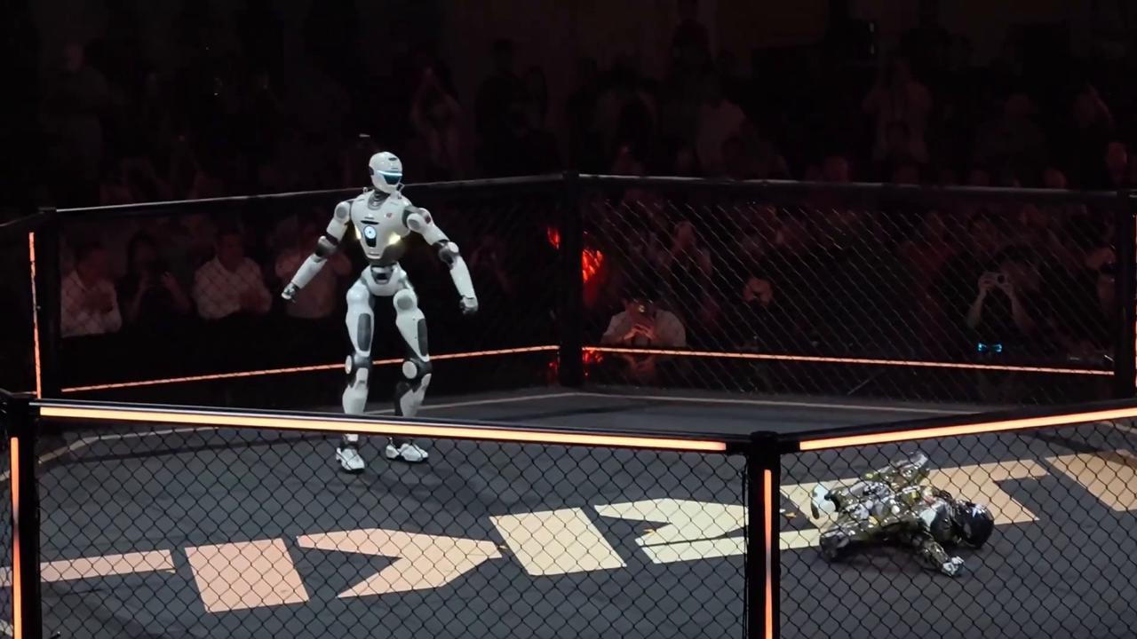 Video thumbnail for China: Robot marks fight victory with a cheeky celebration dance.