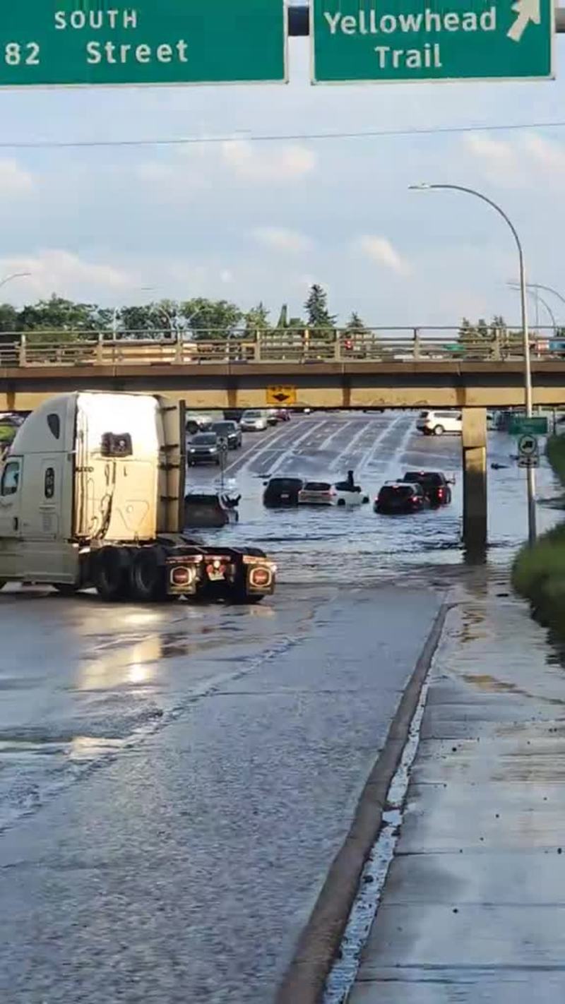 Video thumbnail for Driver Escapes Flooded Underpass after Sudden Storm