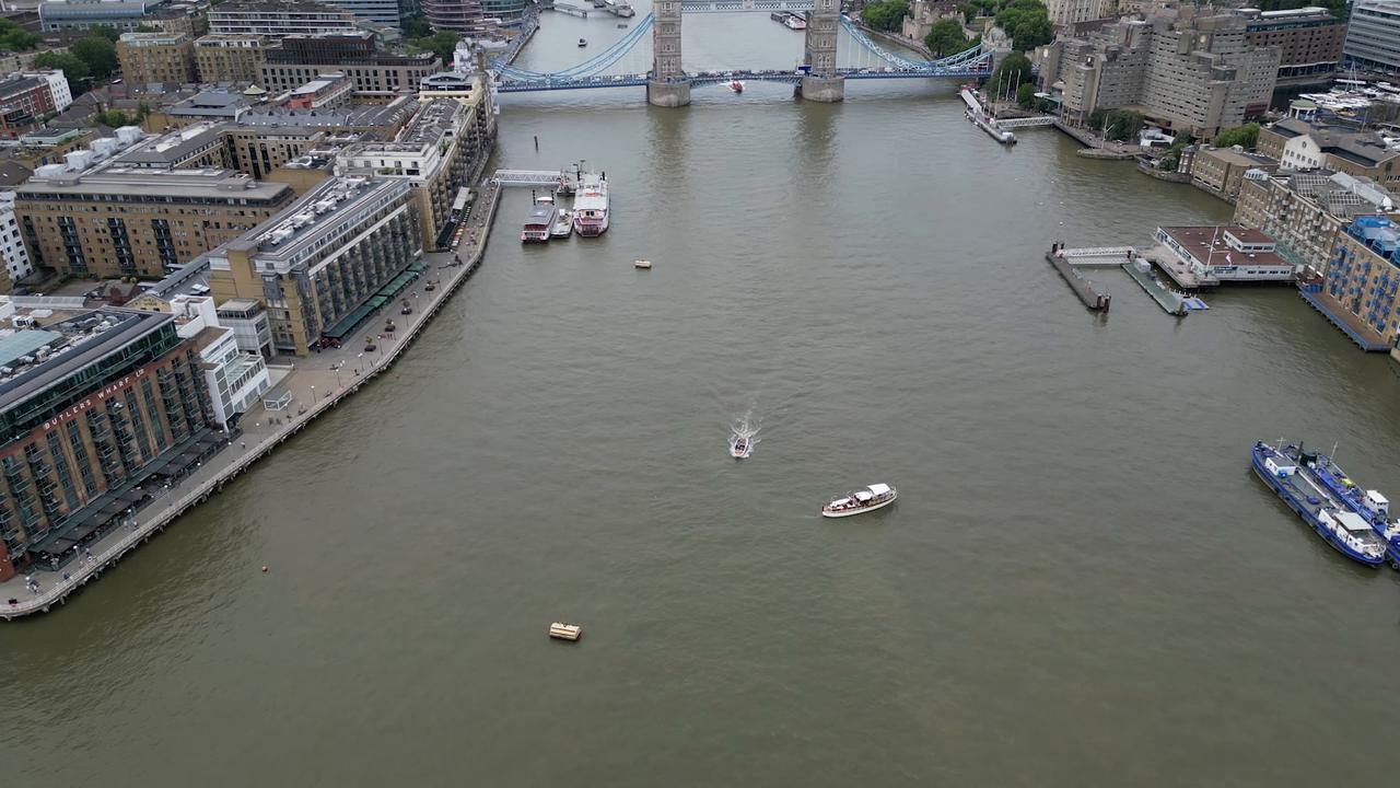 Video thumbnail for UK: River Thames turns murky near Tower Bridge following rainfall in London.