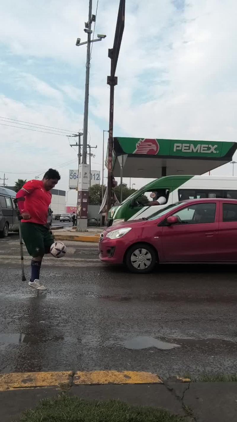 Video thumbnail for Amputee Football Freestyle at a Busy City Intersection