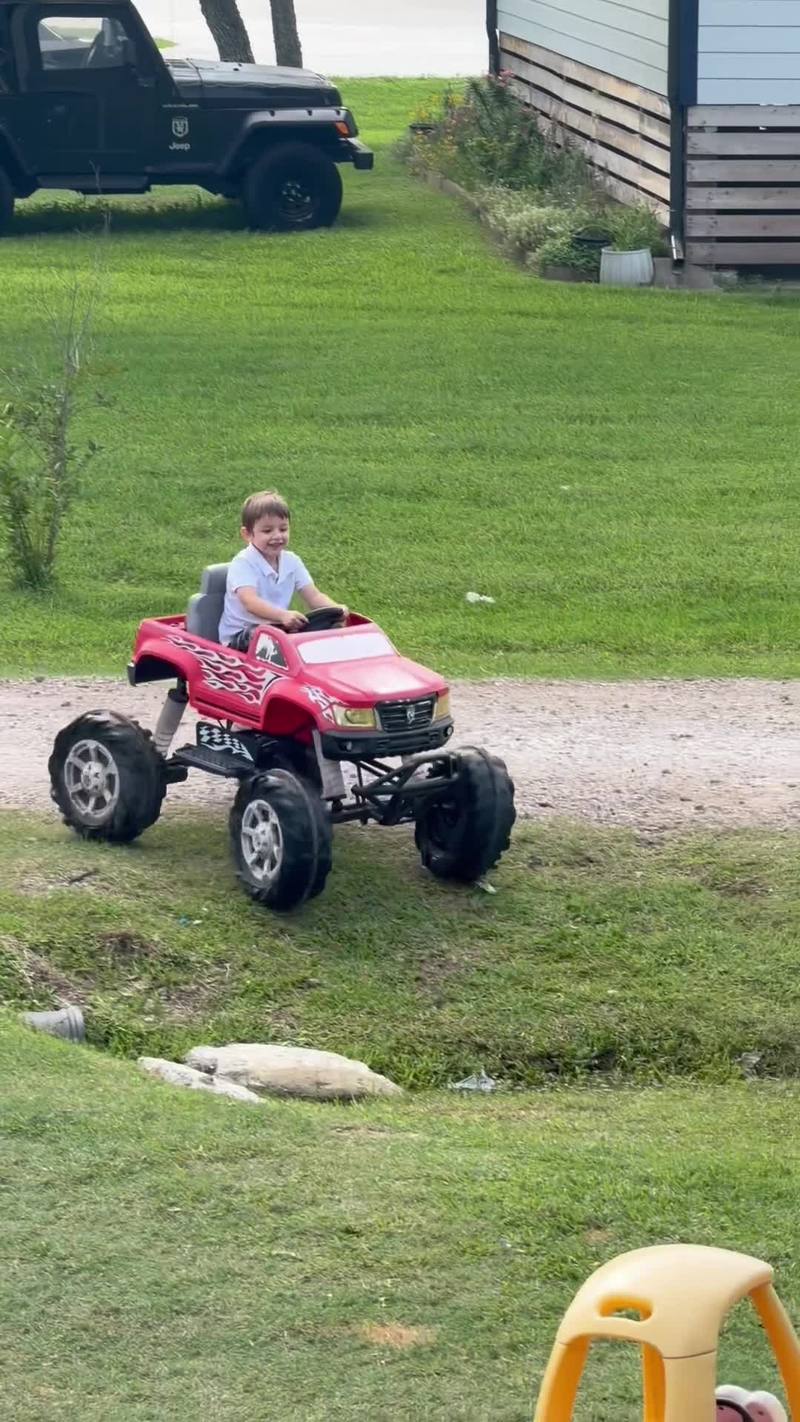 Video thumbnail for Kids Cruising the Yard in a Lifted Toy Truck