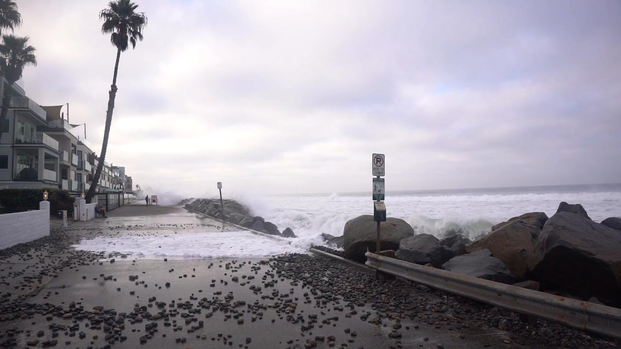 Video thumbnail for CA: Climate Change: Kelvin Swells Batter Oceanside Beaches.