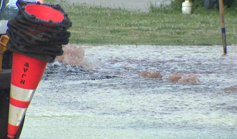 Video thumbnail for Bridgewater water main break sends water rushing through streets as crews dig for source