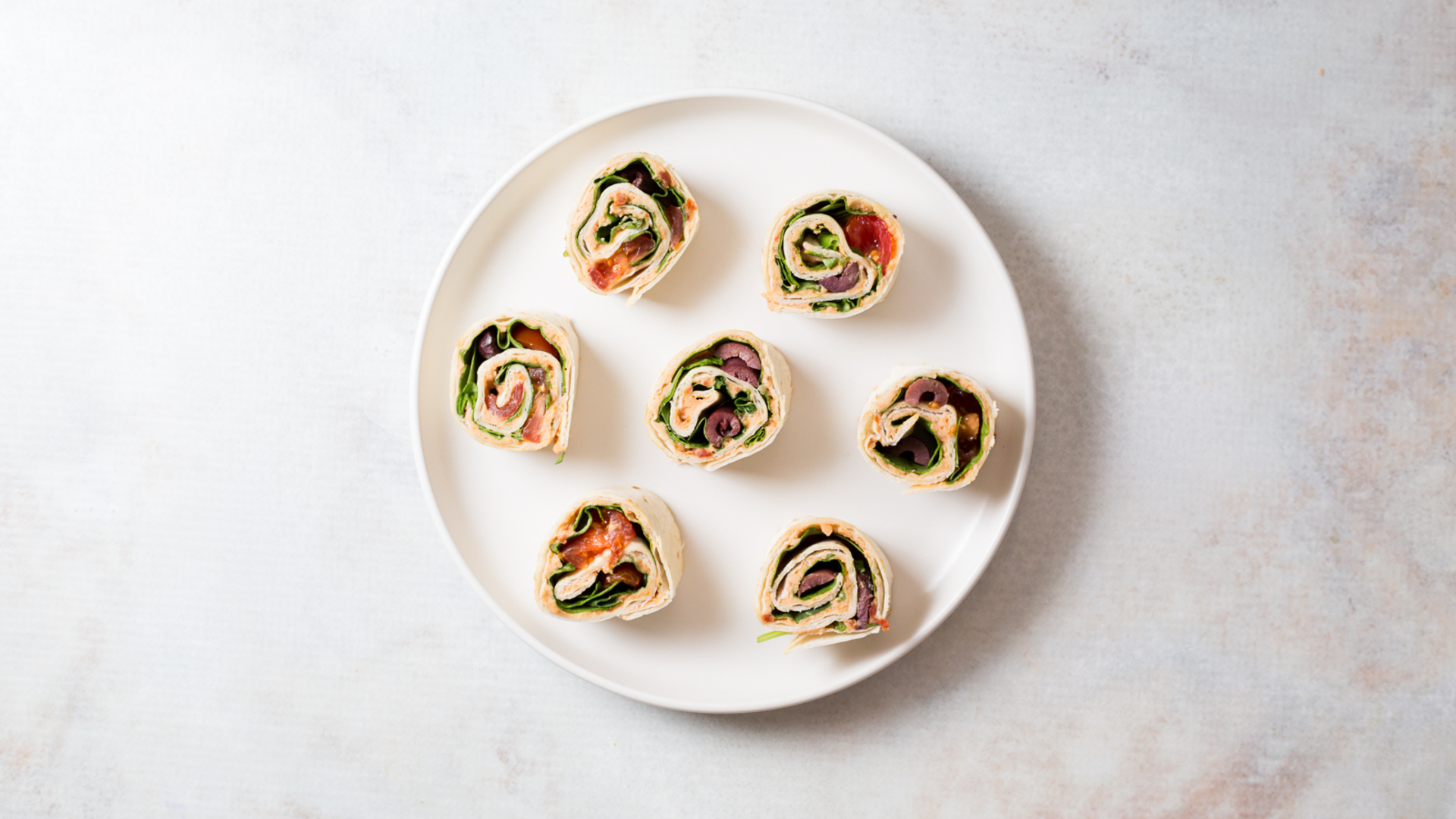 Video thumbnail for Tomato Basil Pinwheels Recipe