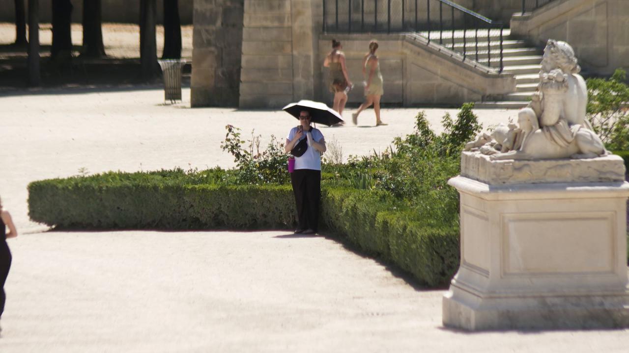 Video thumbnail for France: Parisians seek shade as heatwave grips French capital.