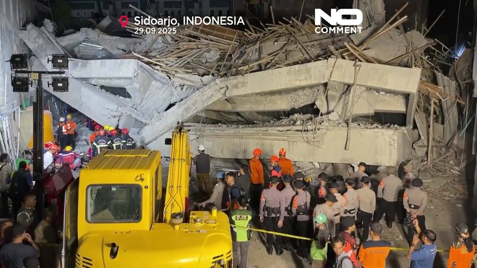 'Video thumbnail for Rescue teams search for survivors after school building collapse in Indonesia'