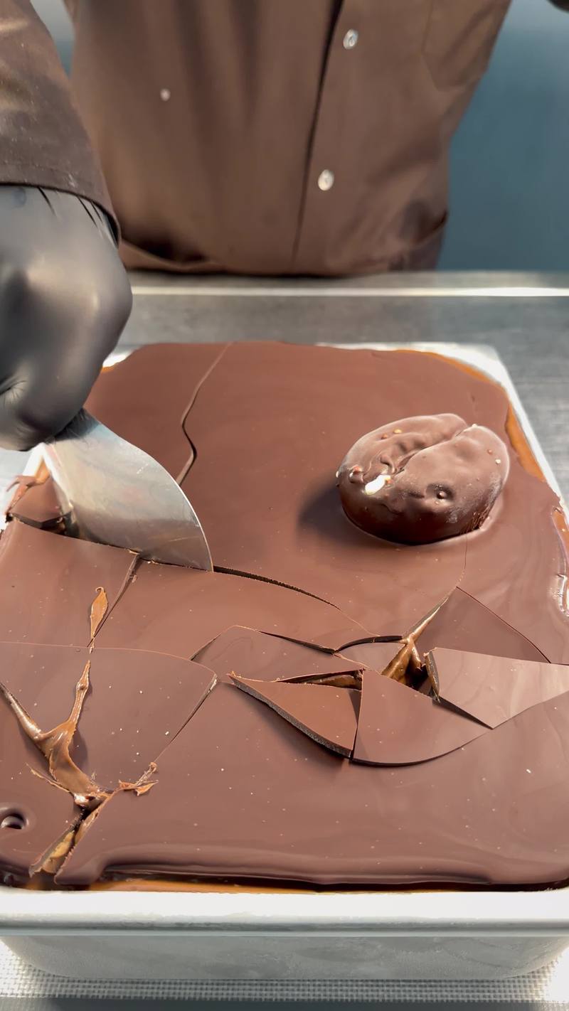 Video thumbnail for Satisfying Chocolate Shell Cracks over Gooey Caramel Dessert