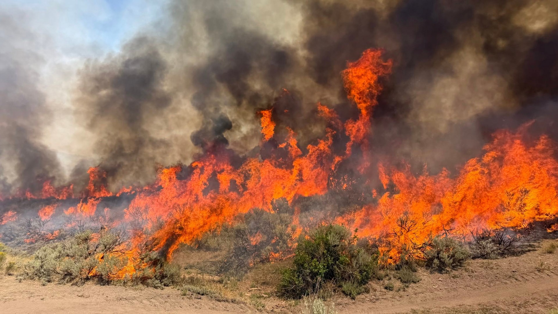 Video thumbnail for As wildfires burn across the West, crews progress around hard-hit Spokane 