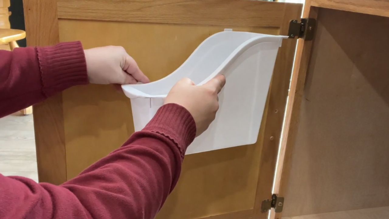 Video thumbnail for Put a Dollar Store book bin in your kitchen cabinet (this is GENIUS!)