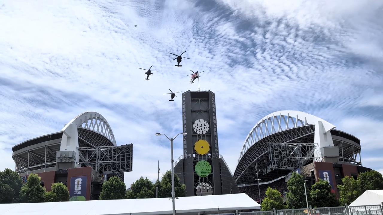 Video thumbnail for US: Military helicopters fly over Lumen Field ahead of USA-Australia World Cup match.