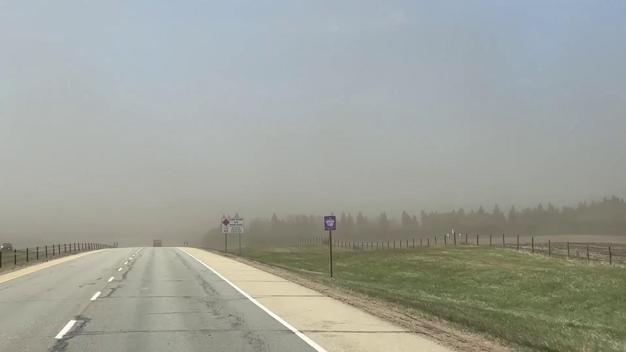 Video thumbnail for Canada: Severe Dust Storm Engulfs Alberta Highway As Winds Rip Soil From Farm Fields.