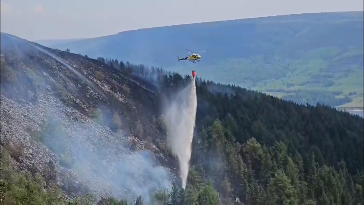 Video thumbnail for US: Firefighters continue battling Derbyshire wildfire as UK heatwave intensifies.