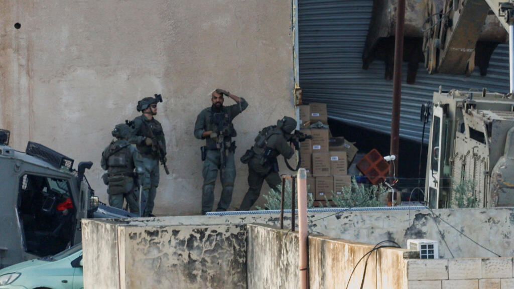 Video thumbnail for Israel forces kill two Palestinians seen surrendering in West Bank raid