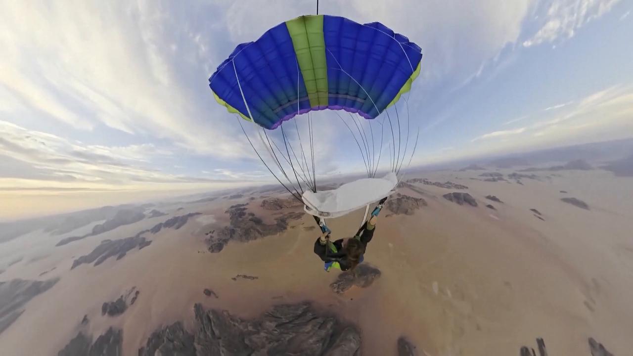Video thumbnail for Jordan: Jordan hosts 1st int'l hot air balloon skydiving event over iconic red desert.