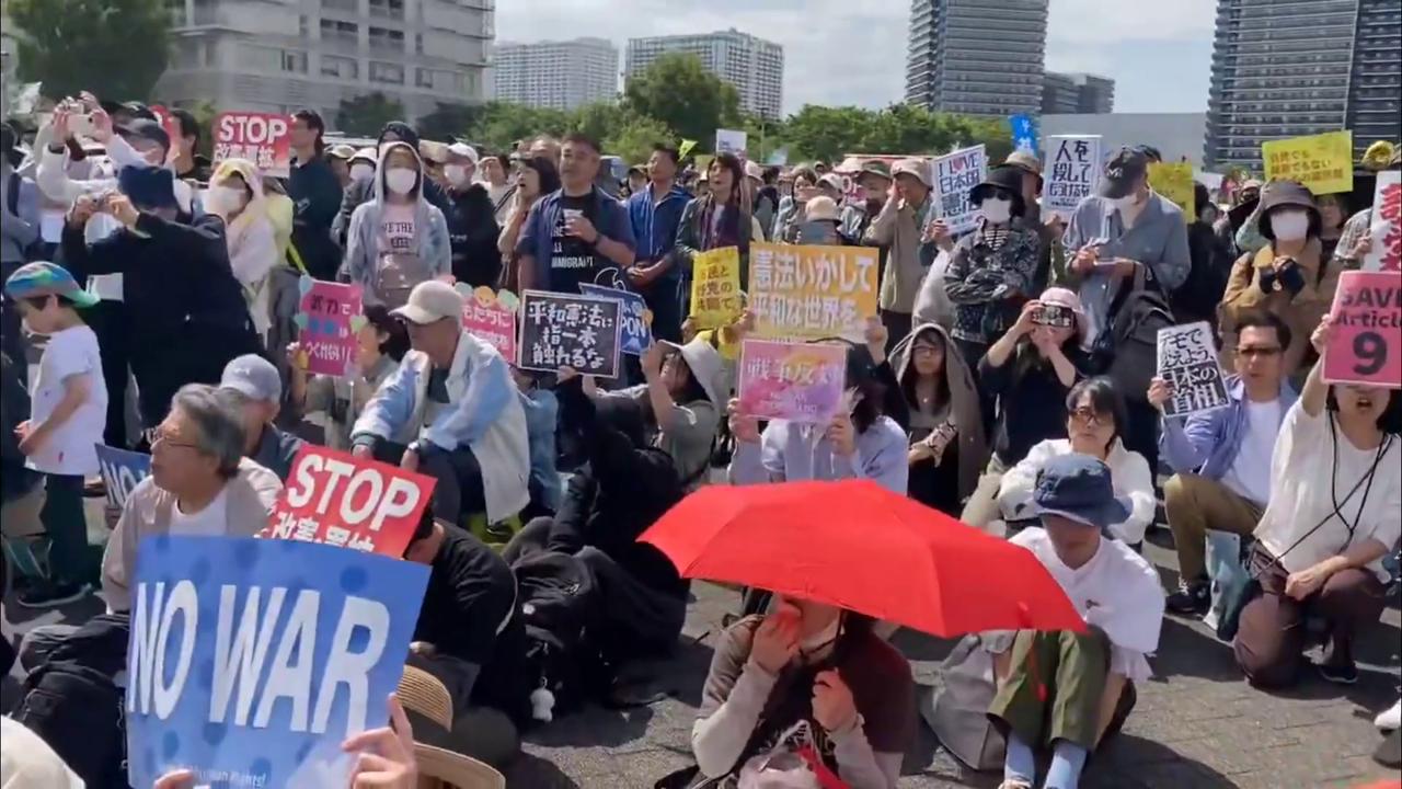 Video thumbnail for Japan: Crowds Rally in Tokyo to Defend Japan’s Pacifist Constitution.