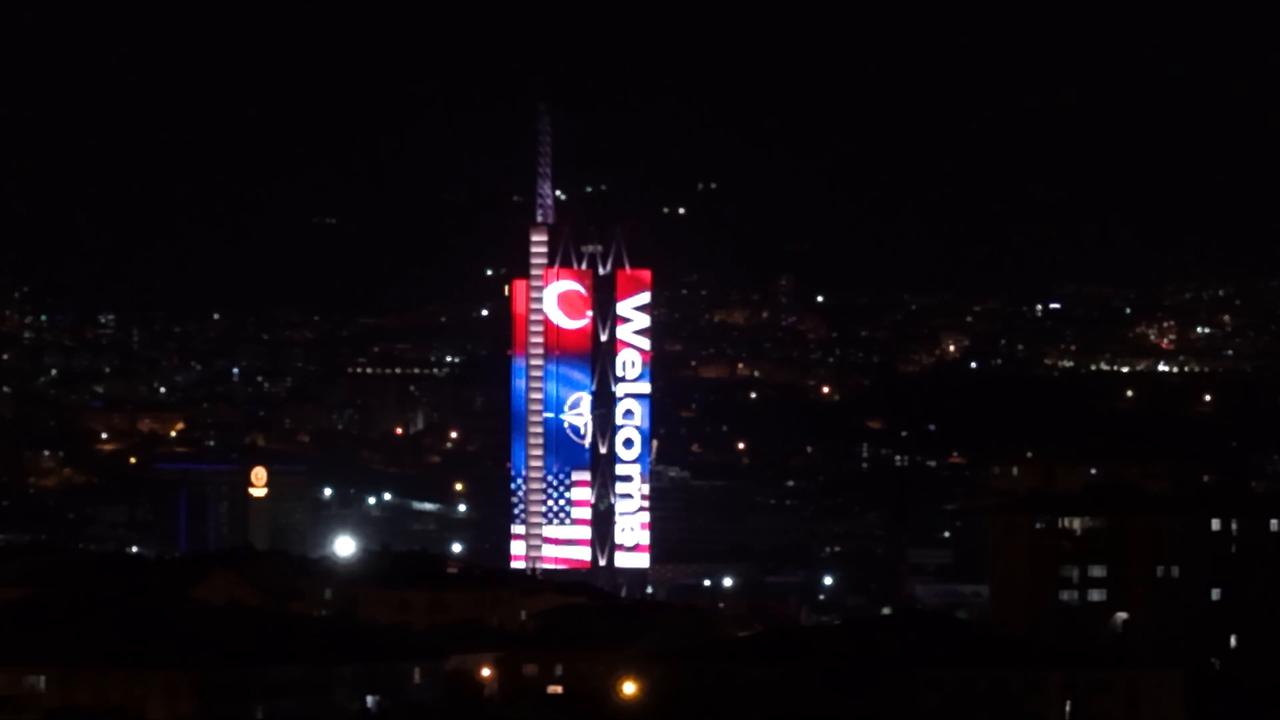 Video thumbnail for Türkiye: NATO member flags projected onto landmark building in Ankara.