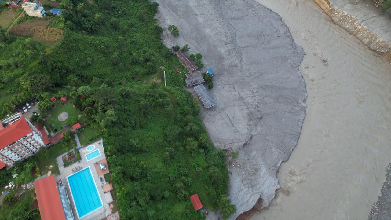 Video thumbnail for Nepal: Aerial footage shows trail of destruction left by Nepal's flash floods in Bidur.