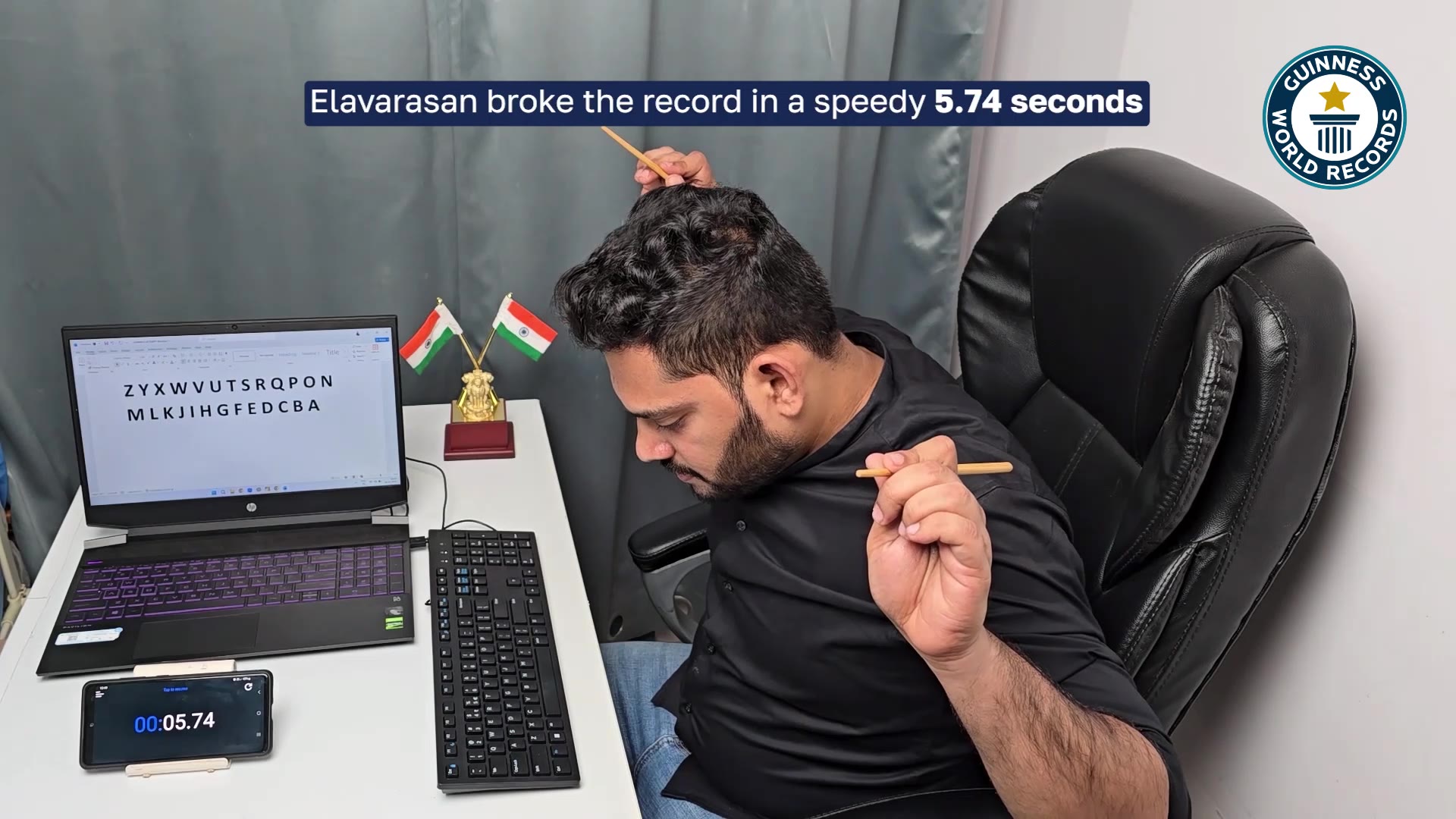 Video thumbnail for Elavarasan sets typing record using chopsticks in seconds