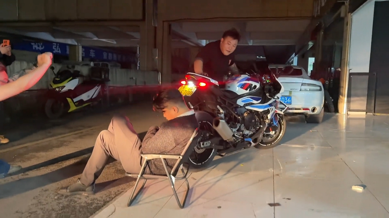 Video thumbnail for Man Startled Awake by Revving Motorcycle in China