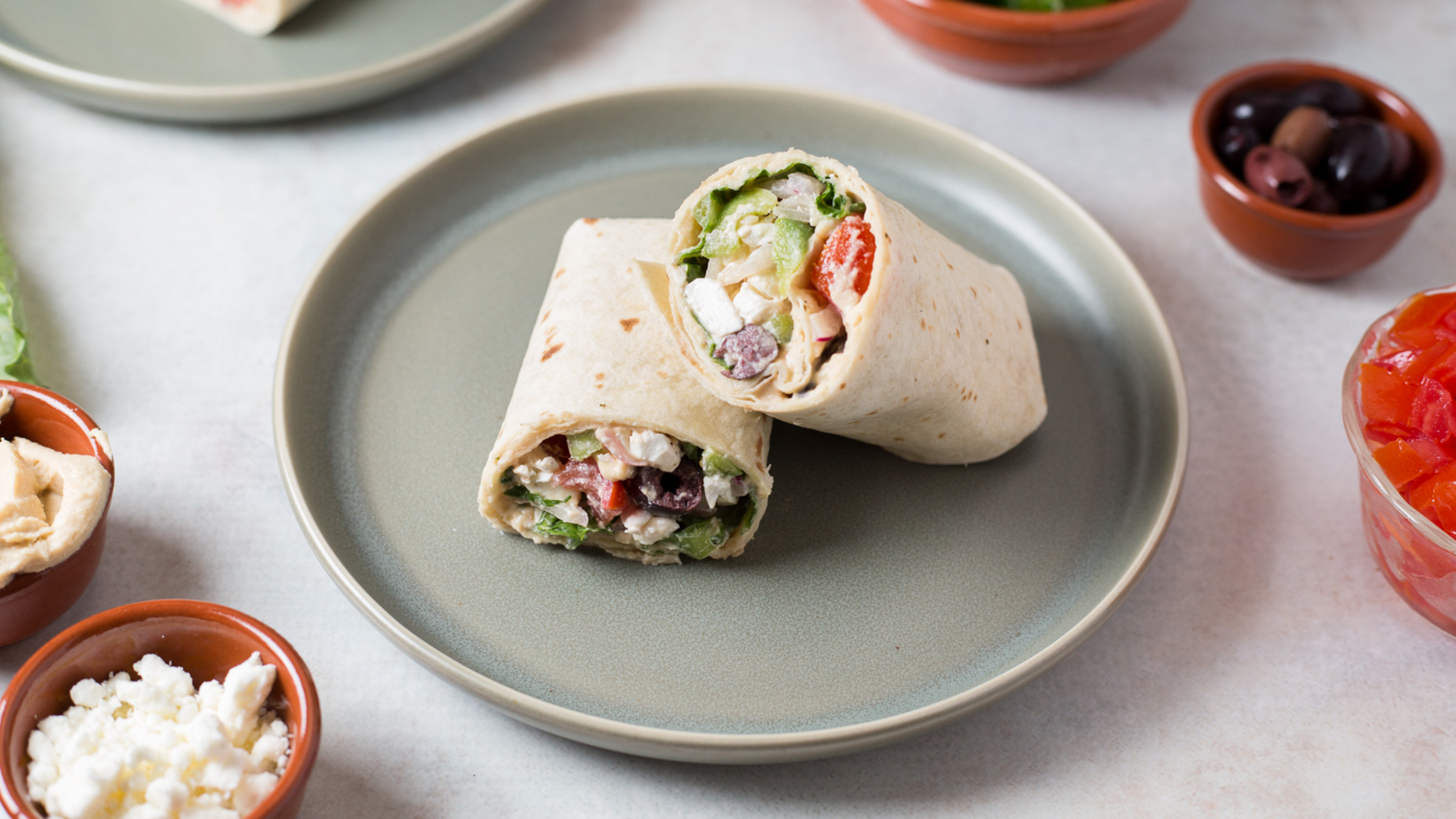 Video thumbnail for This Greek Salad Wrap Recipe Is Fresh, Filling, And Ready In 10 Minutes