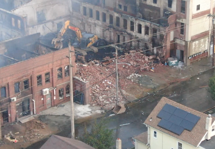 Video thumbnail for Demolition crews taking down the entire fire‑ravaged building in Belleville