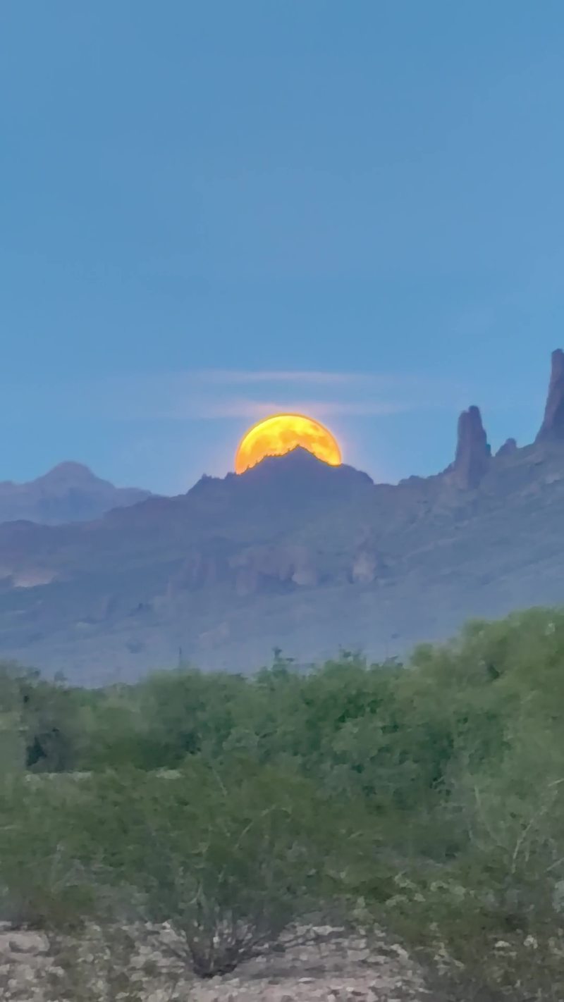 Video thumbnail for Golden Harvest Moon Rising over the Superstition Mountains