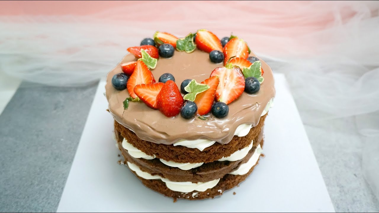'Video thumbnail for Dark chocolate drip cake recipe with strawberries fruit for birthday'