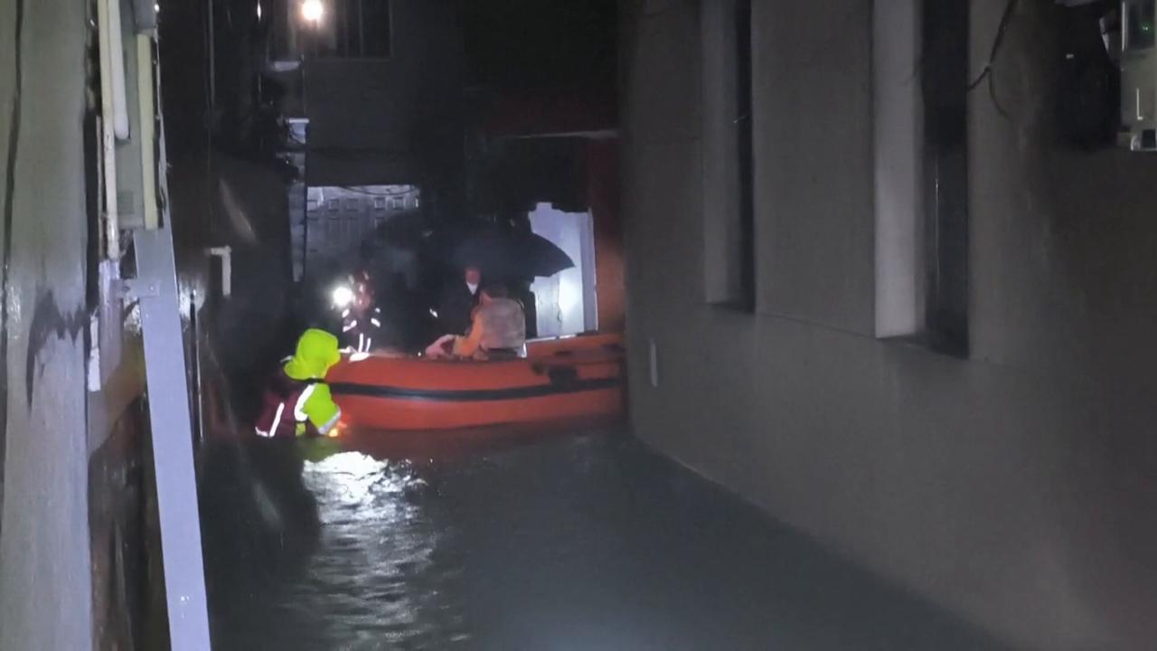 Video thumbnail for China: Firefighters rescue trapped people as Typhoon Dolphin batters coastal Zhejiang.