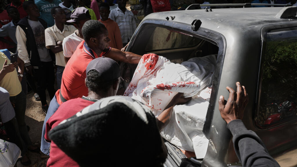 Video thumbnail for In Haitin, dozens die in gang coalition attack on a farming community