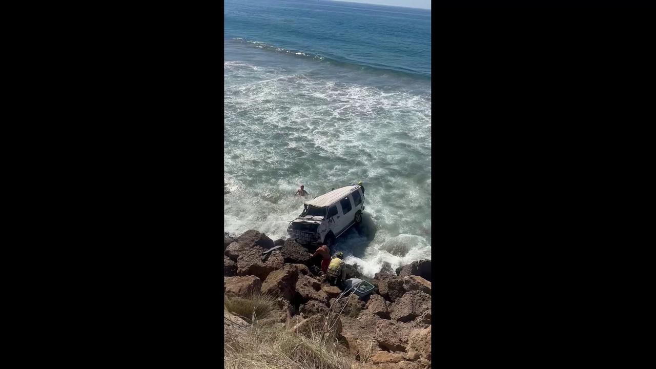 Video thumbnail for US: Firefighters Brave Surging Waves To Rescue Dog Trapped In Wrecked Van.