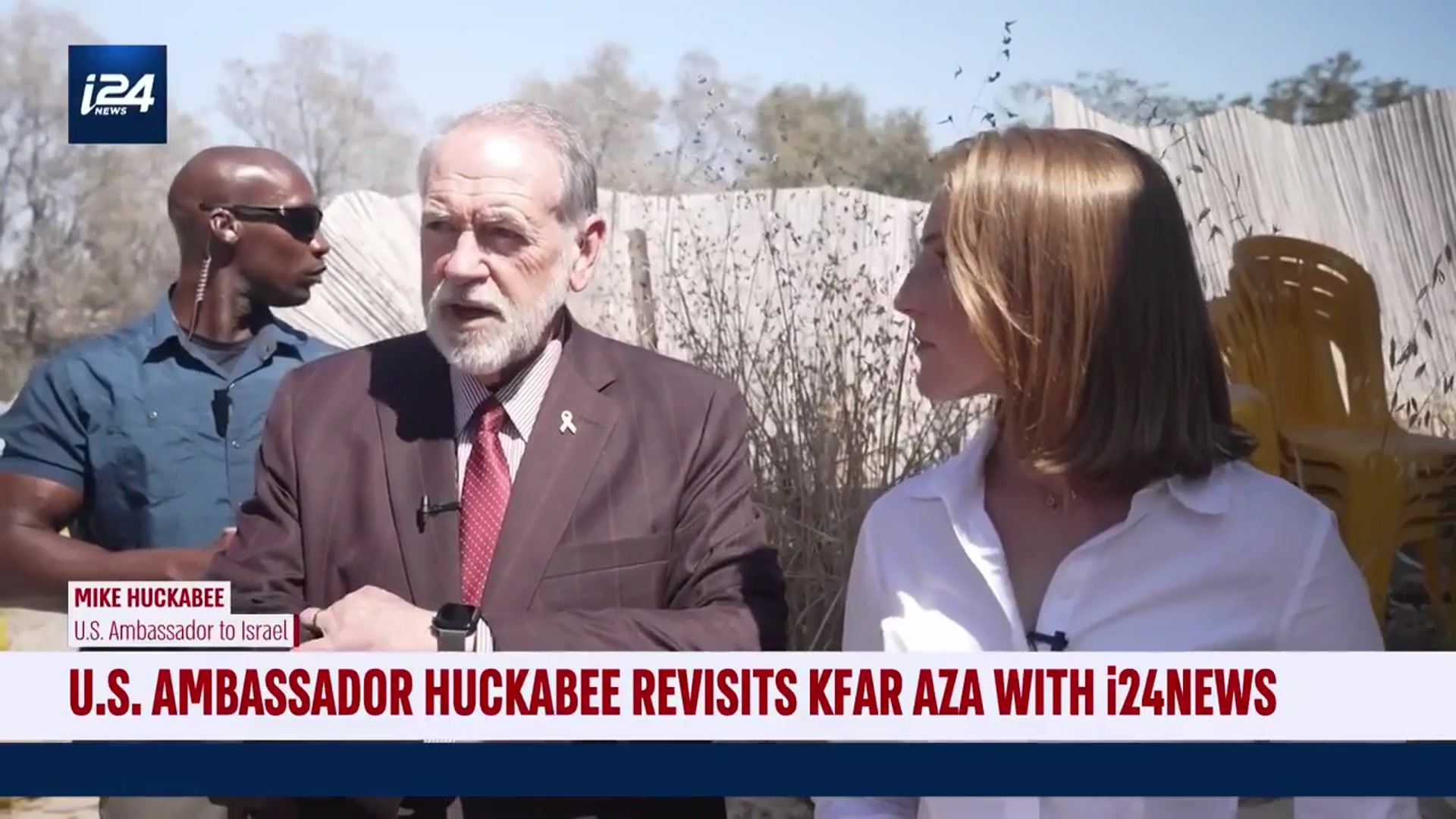 'Video thumbnail for US Ambassador Huckabee revisits Kfar Aza with i24NEWS'