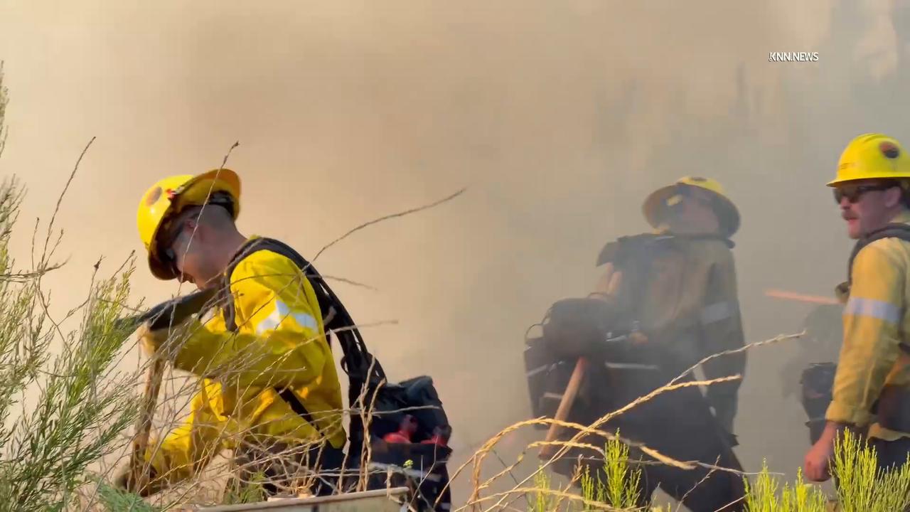 Video thumbnail for US, Los Angeles: Santa Clarita Mike Fire Burns Near Valencia Apartments Part 1.