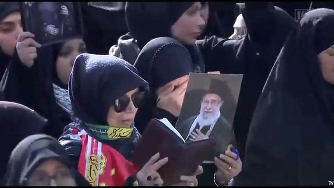 Video thumbnail for Iran: Mourners Flock to Imam Khomeini Prayer Hall for Funeral Tribute.