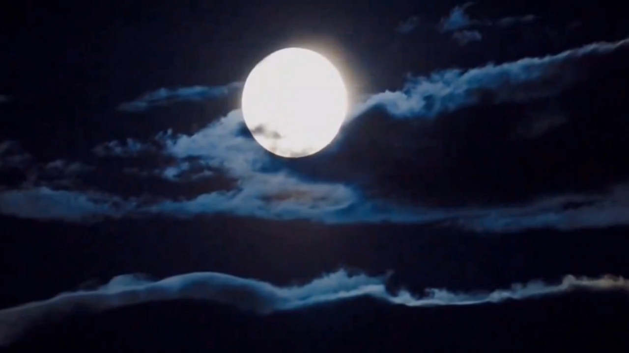 Video thumbnail for Spooky Full Moon Lights Up the Night Sky Over Magna, Utah