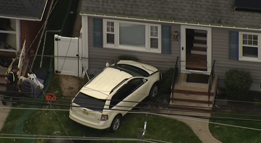 Video thumbnail for SUV crashes into Linden home after collision; other driver flees scene