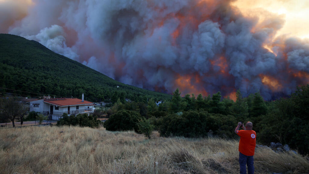 Video thumbnail for In blazing Greece, anger grows among residents forced to evacuate
