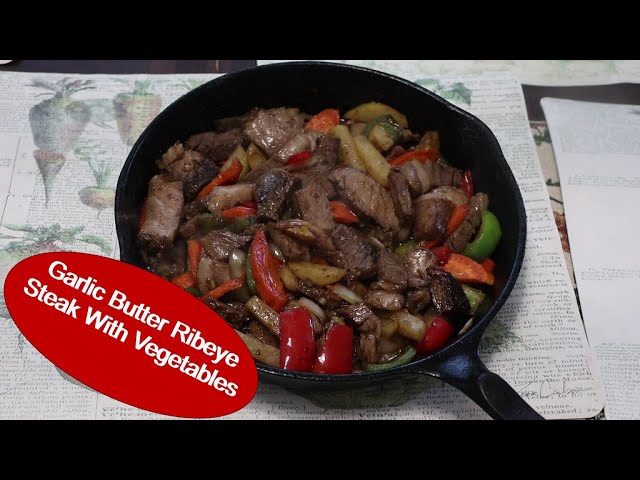 Video thumbnail for Garlic Butter Ribeye Sliced Steak With Vegetables.