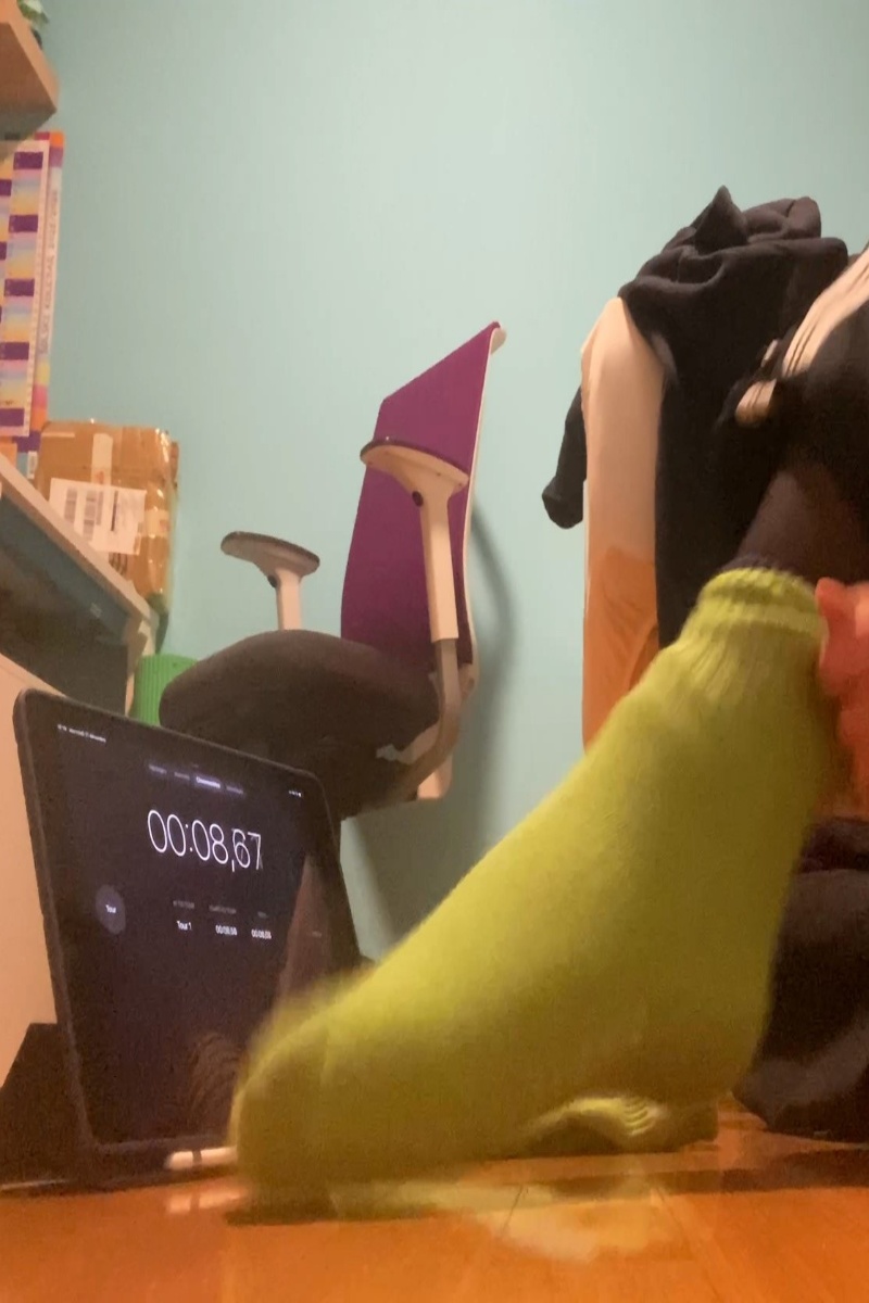 Video thumbnail for Fastest time to put on 10 socks on one foot - 11.61 seconds by Hana Bele