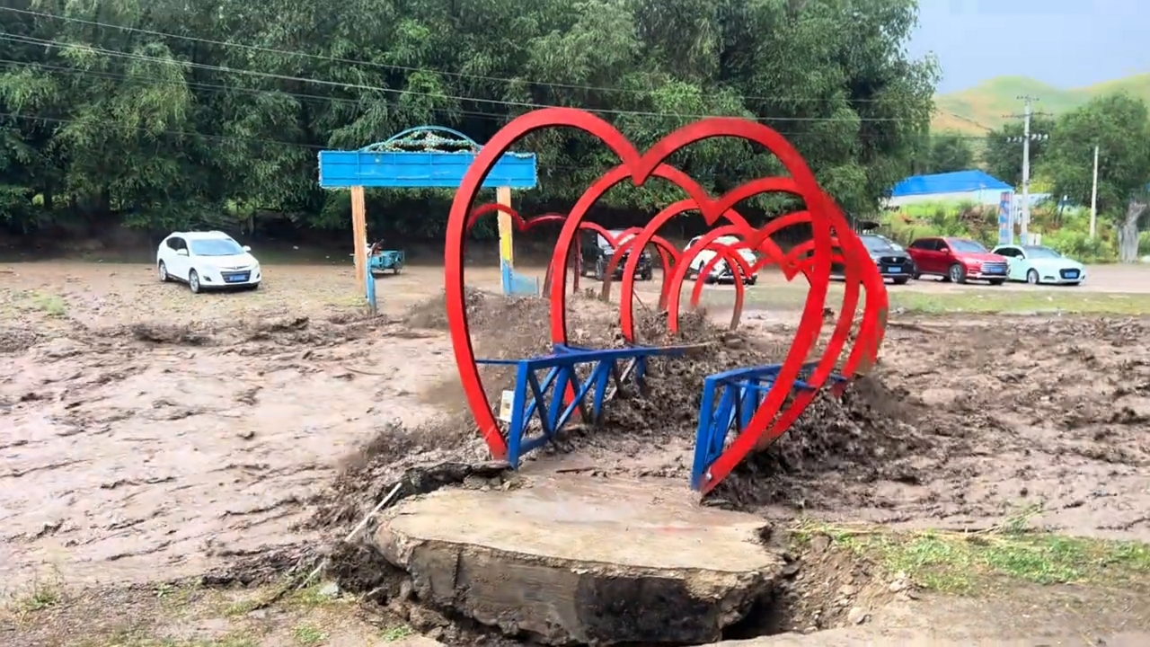 Video thumbnail for Flash Flood Wrecks Yining Scenic Park in Xinjiang