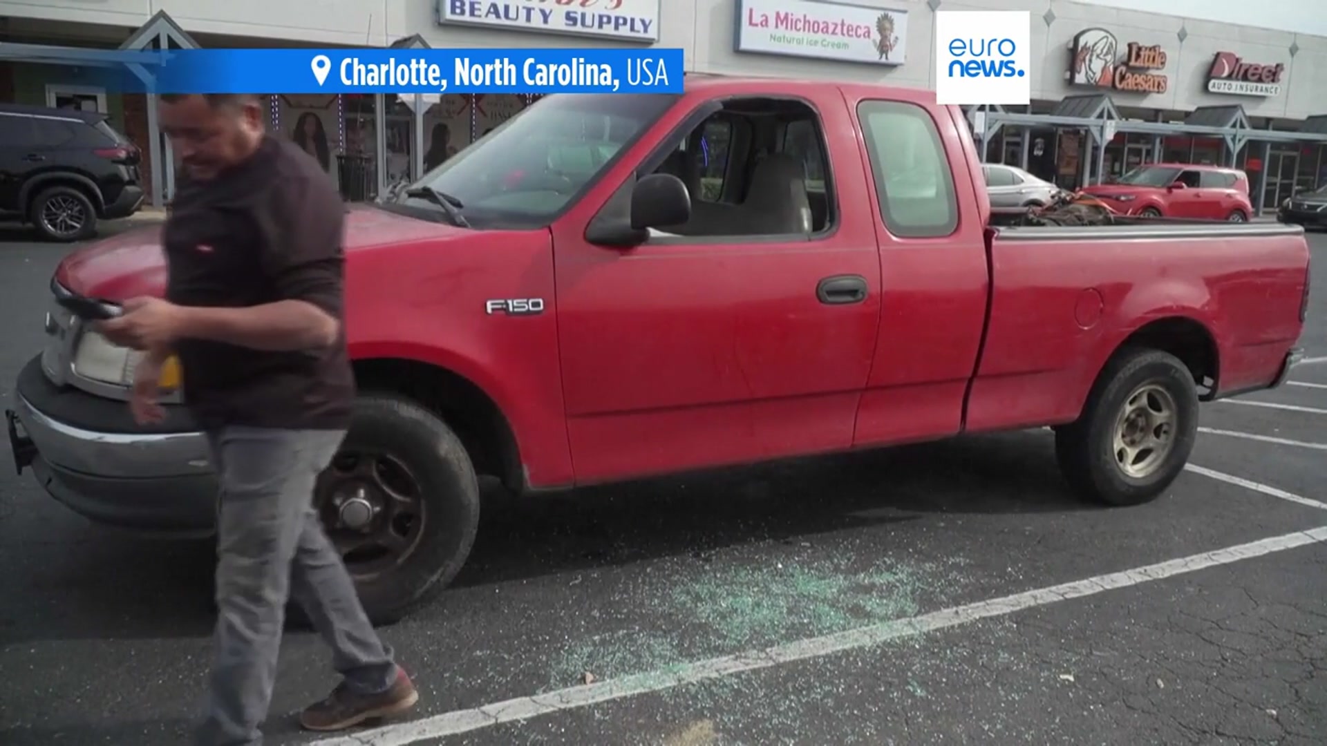 'Video thumbnail for Immigration crackdown in Charlotte:  Man films car window being smashed by agents'