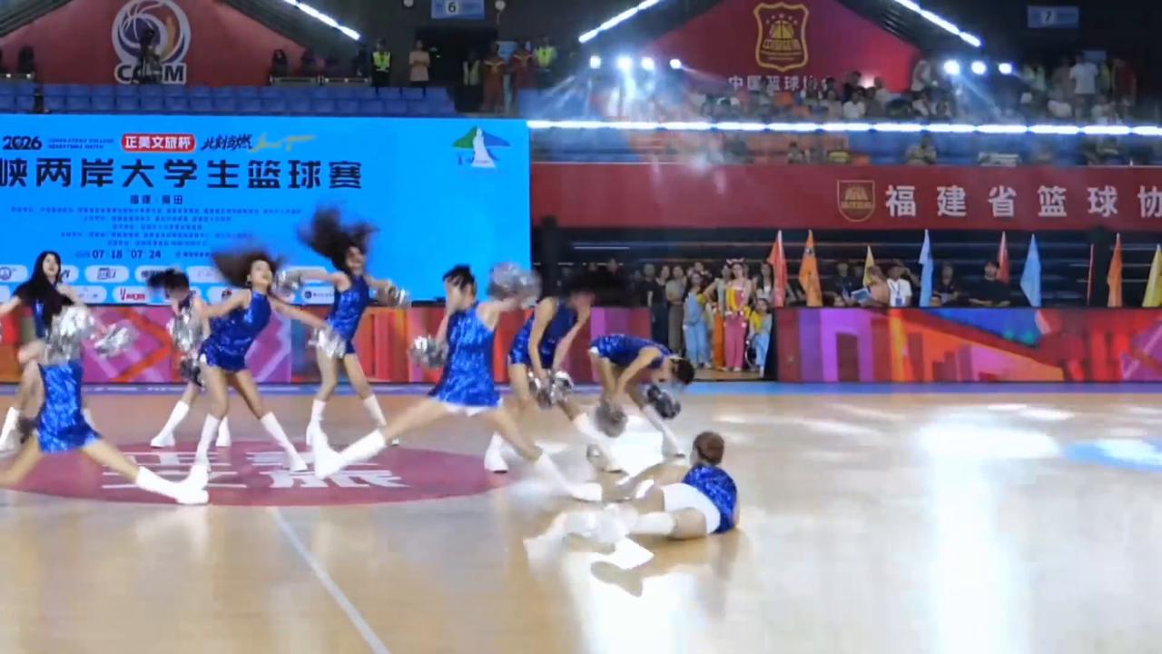Video thumbnail for China: Chinese cheerleader turns failed flip into split during basketball game.