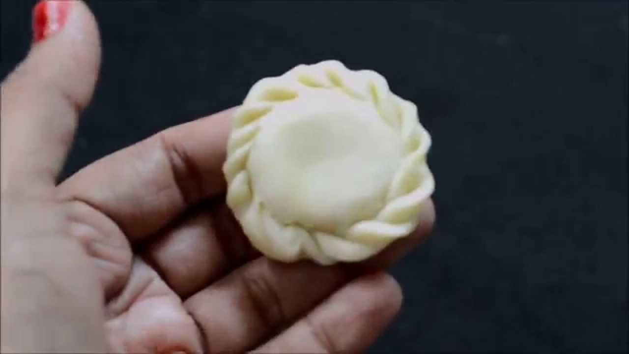 Video thumbnail for How to make badusha swirls shape / Balushahi Shape