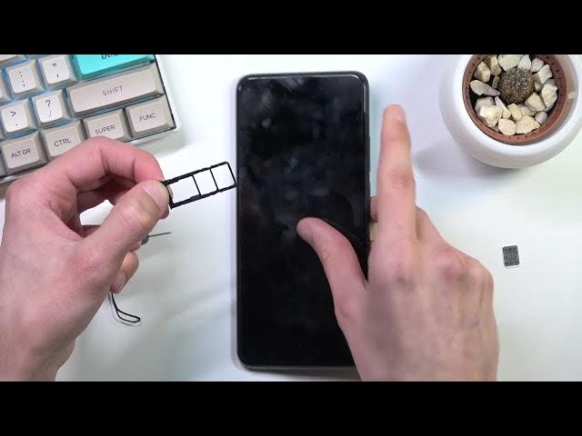 Video thumbnail for How to Insert SIM card in to OPPO A15s - Insert SD Card