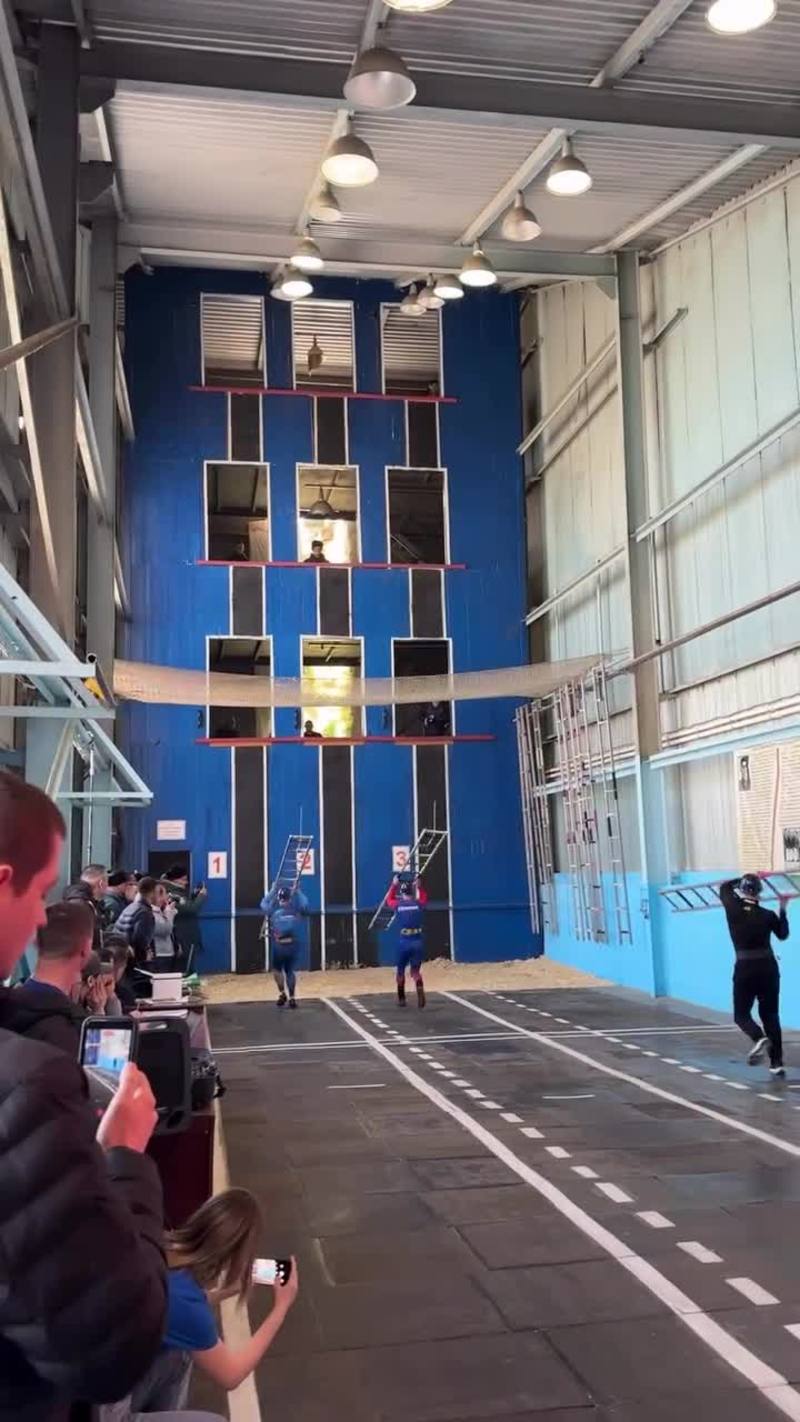 Video thumbnail for Firefighter Athletes Racing up a Training Tower