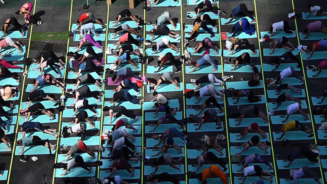 Video thumbnail for NY: Summer Solstice In Times Square - Mind Over Madness Yoga.